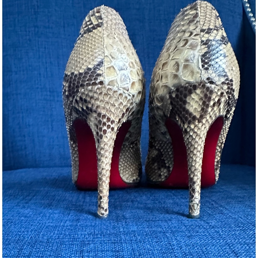 CHRISTIAN LOUBOUTIN python snake heels.